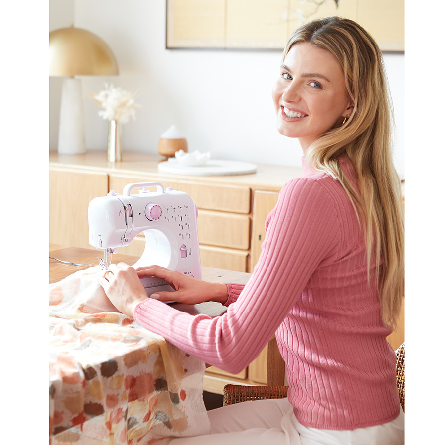 Compact 12 Stitches Sewing Machine Innovations